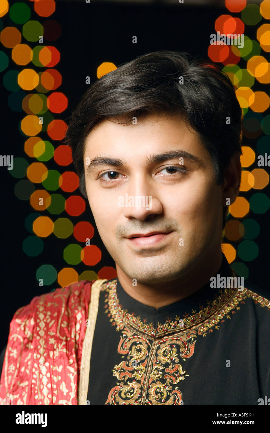 Portrait of a young man wearing traditional Indian clothing Stock Photo ...