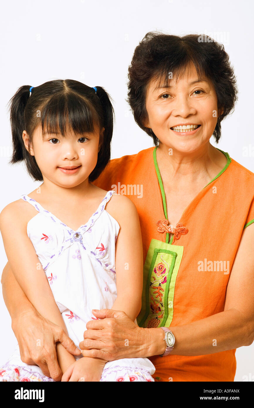 Portrait of a mature woman with her granddaughter Stock Photo