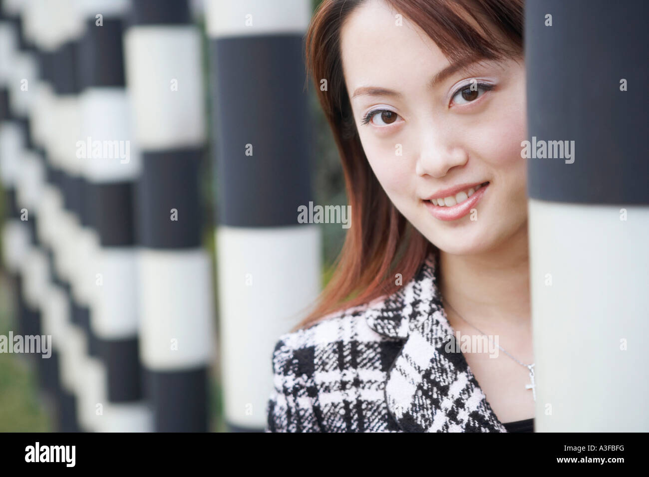 Portrait of a young woman smiling Stock Photo