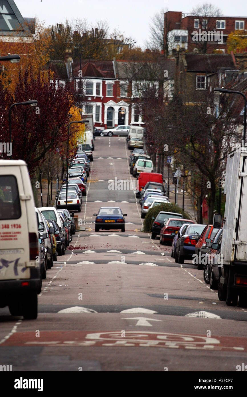 Speed bumps on long residential street in Hackney Stock Photo