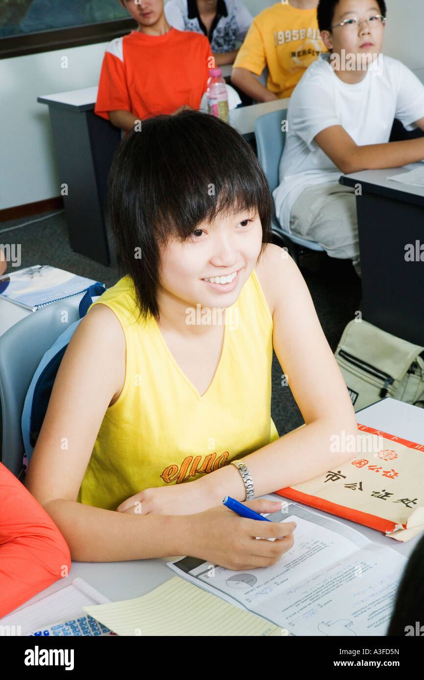 High angle view of a teenage girl sitting in the classroom Stock Photo ...