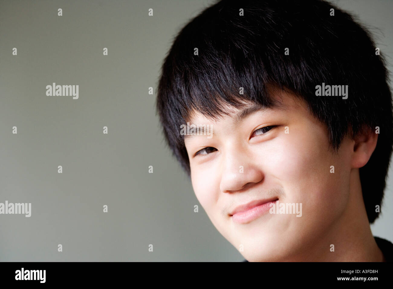 Teenage black boy smiling face hi-res stock photography and images - Alamy