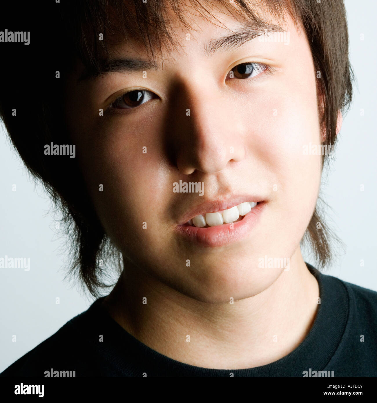 Portrait of a young man smiling Stock Photo - Alamy