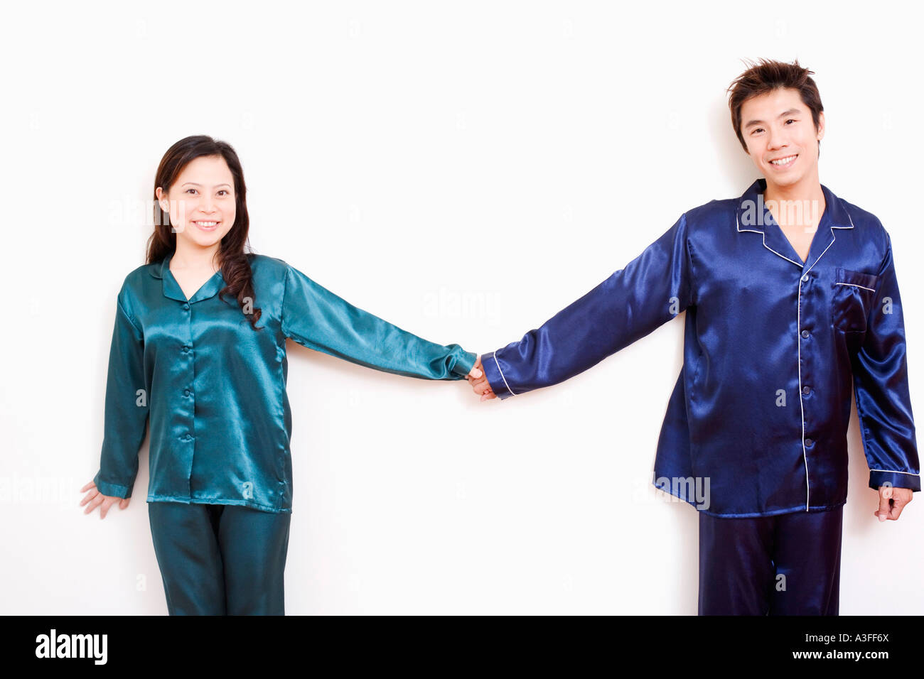 Young asian men holding hands hi-res stock photography and images - Alamy