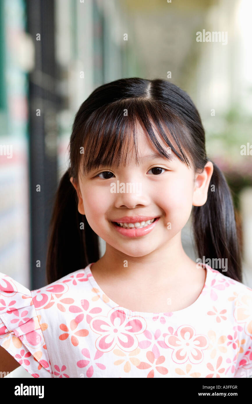 Portrait of a girl smiling Stock Photo - Alamy