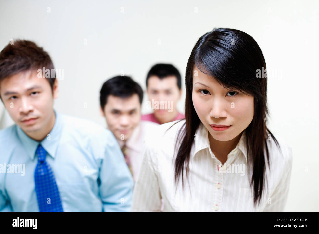 Portrait of business executives standing together Stock Photo - Alamy