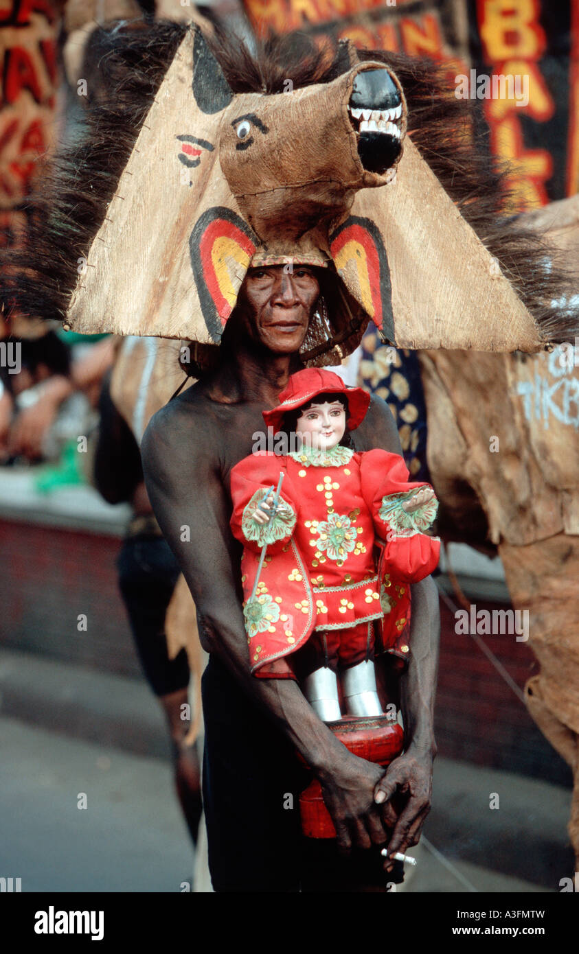 Philippines, Aklan, Kalibo, dancer with Saint Nino Stock Photo