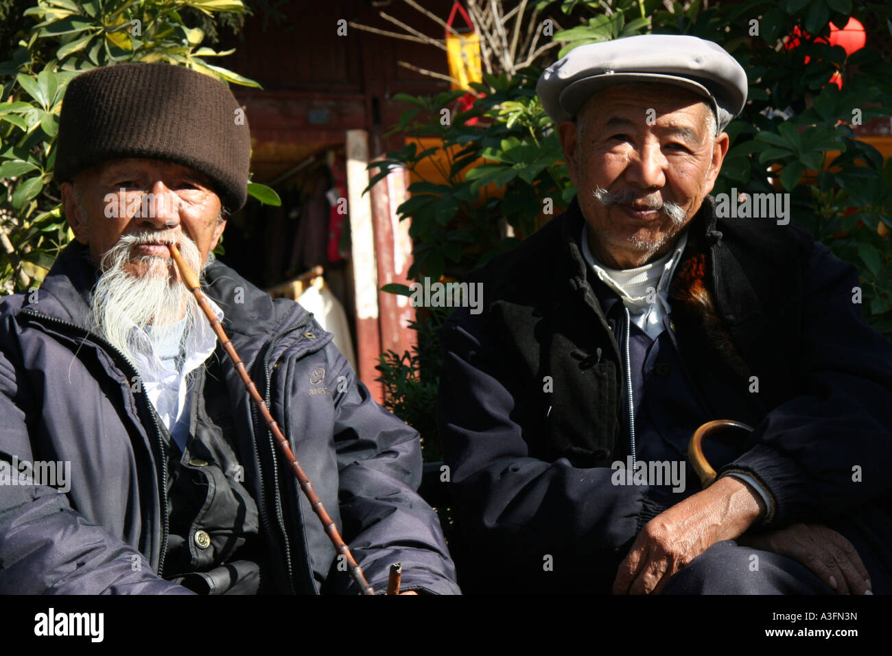 China Lijiang Old Men Portrait With Pipes Sticks Beard Stock