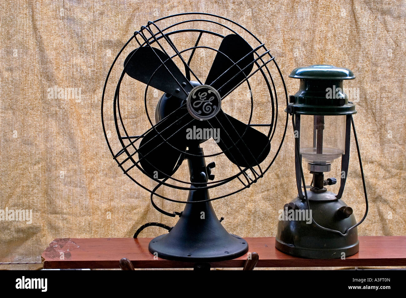 Front view of a General Electric vintage fan and oil lamp Stock Photo -  Alamy