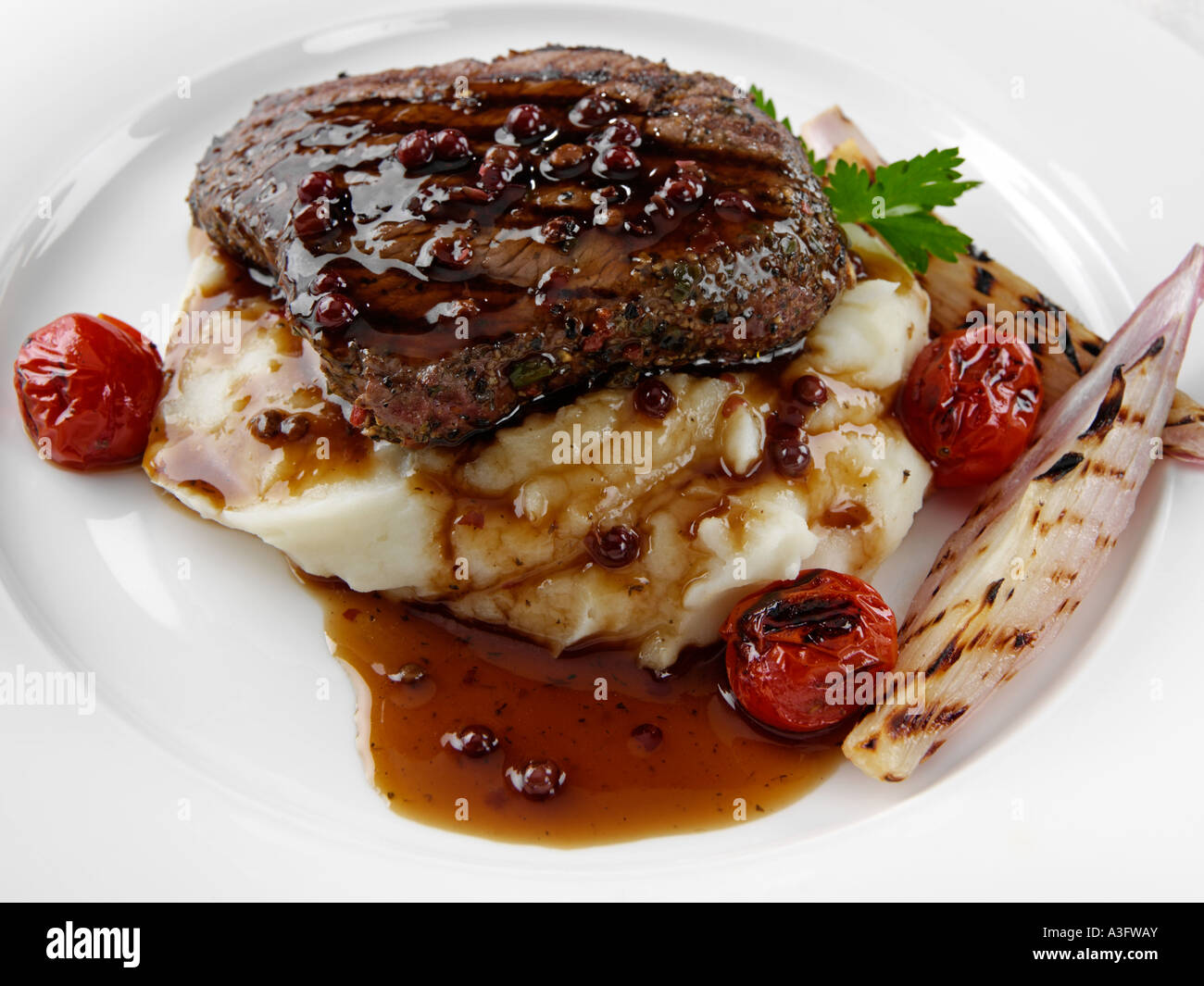 Peppered Rump Peppered rump steak on a bed of mashed potato editorial food Stock ...