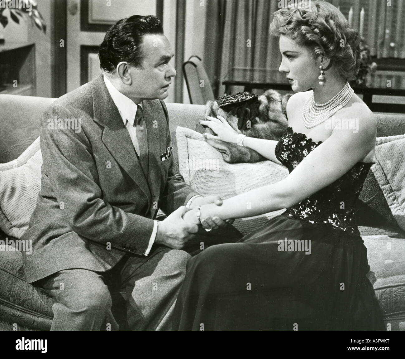 THE GLASS WEBB 1953 Universal film with Kathleen Hughes and Edward G Robinson Stock Photo