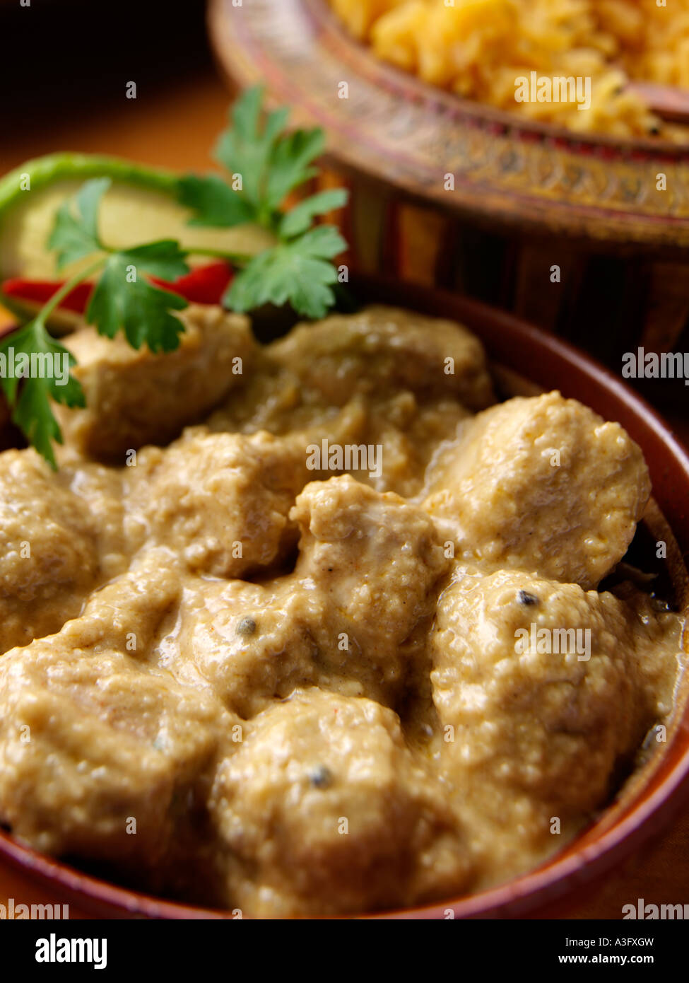 Indian chicken korma curry with saffron rice editorial food Stock Photo