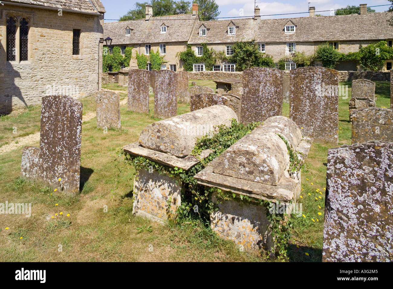 The churchyard of St Leonards church in the Cotswold village of Bledington, Gloucestershire Stock Photo