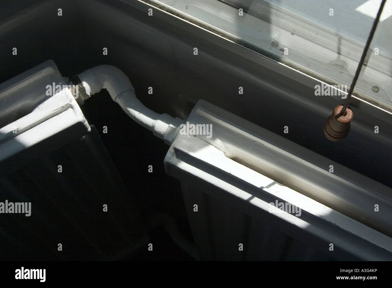 Sun catches the top of a radiator Stock Photo - Alamy