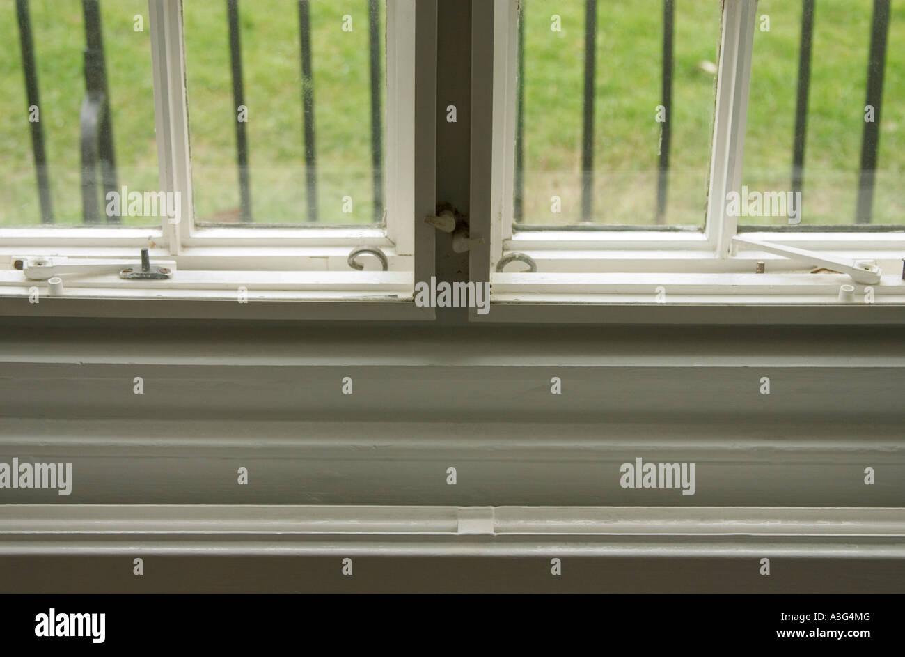 Radiator top and window frame looking outwards Stock Photo - Alamy