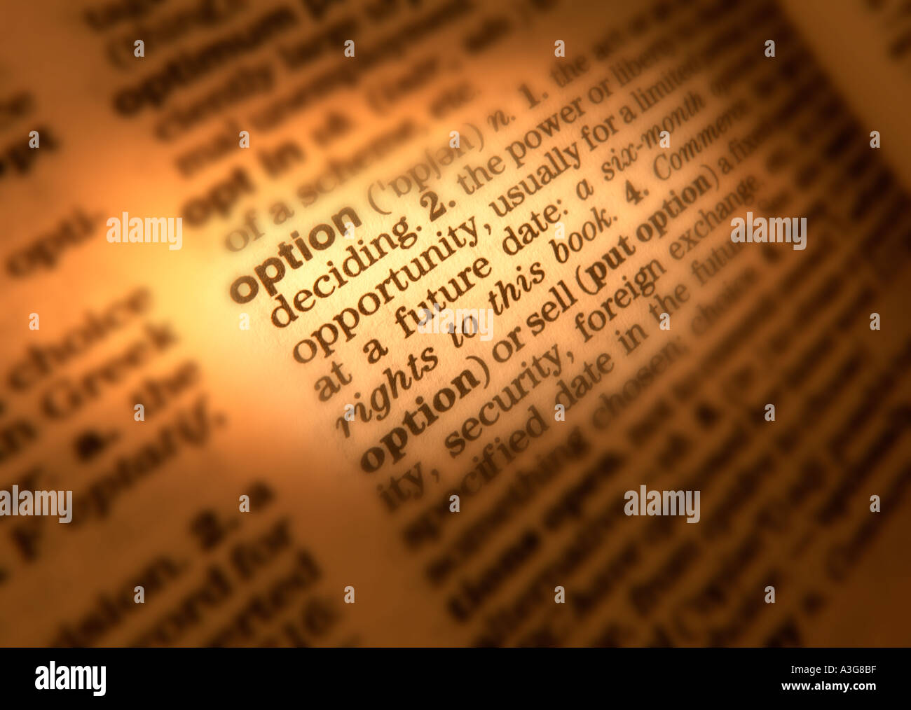 CLOSE UP OF DICTIONARY PAGE SHOWING DEFINITION OF THE WORD OPTION Stock Photo