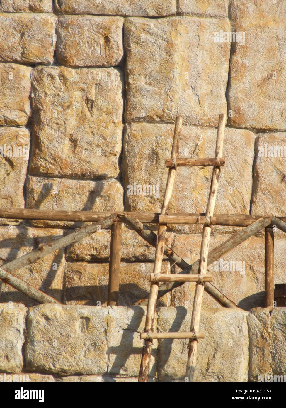 home made rope ladder and wall by historic ancient site monument wall ...