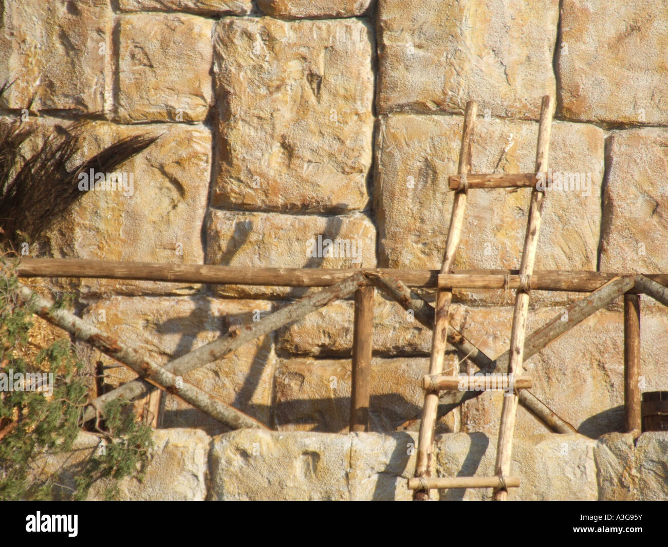 home made rope ladder and wall by historic ancient site monument wall ...