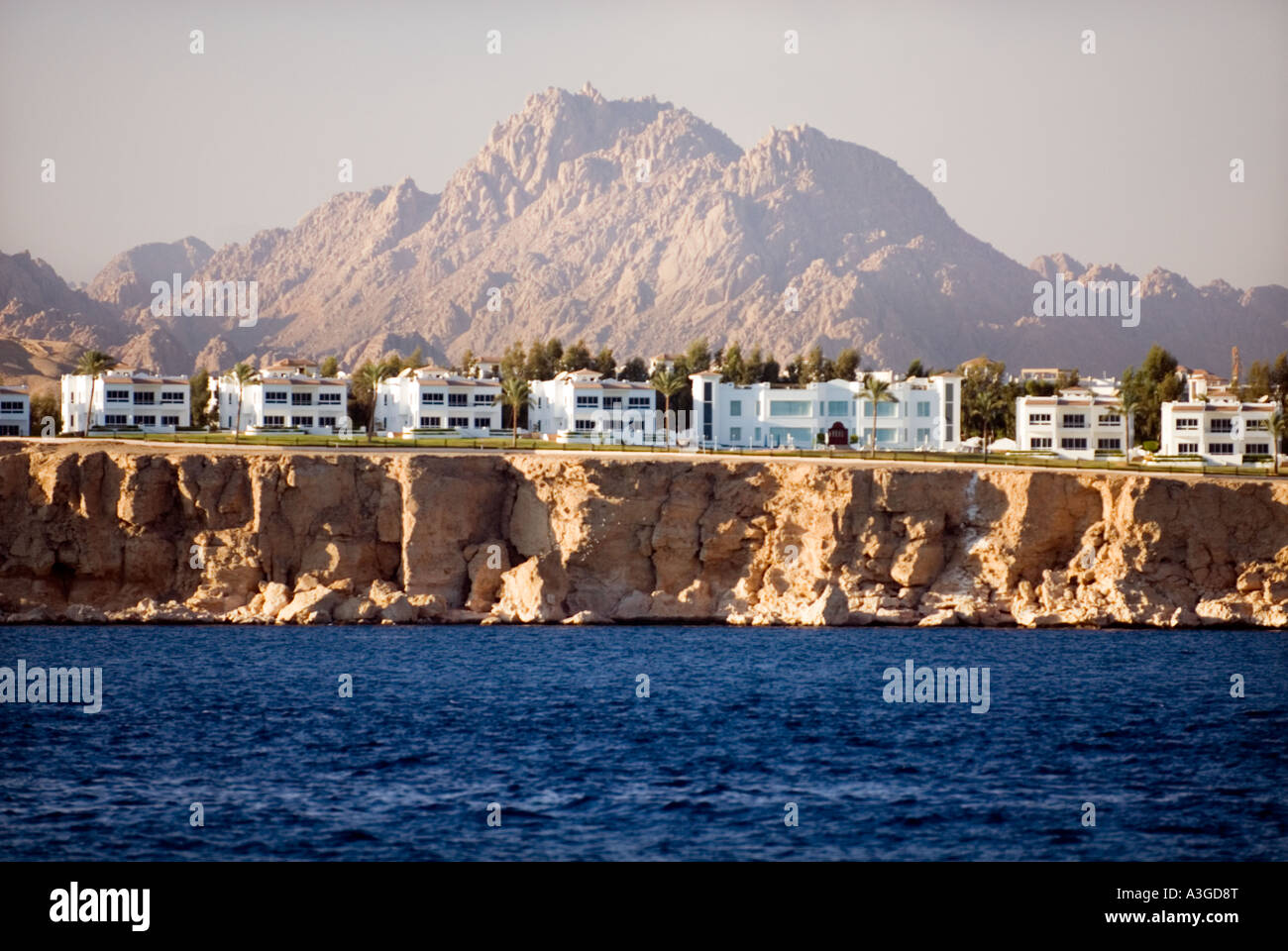 sea and desert island coast waterline deep blue sea RAS MOHAMED Sharm El Sheikh EGYPT sinai Peninsula beach mountain Stock Photo