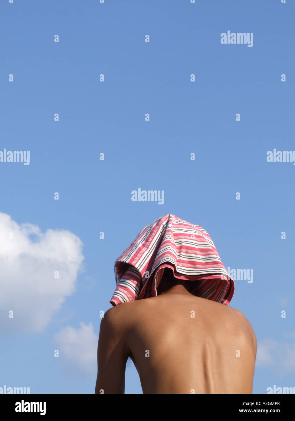 boy with t shirt on head Stock Photo Alamy