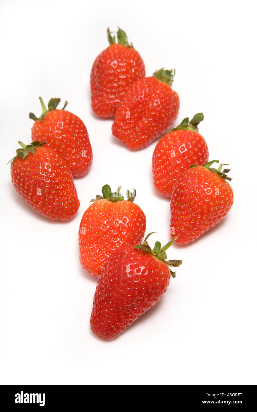Strawberries isolated on a white studio background Stock Photo - Alamy