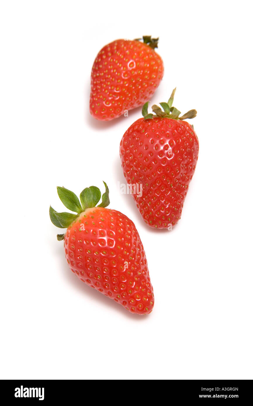 Strawberries isolated on a white studio background Stock Photo - Alamy