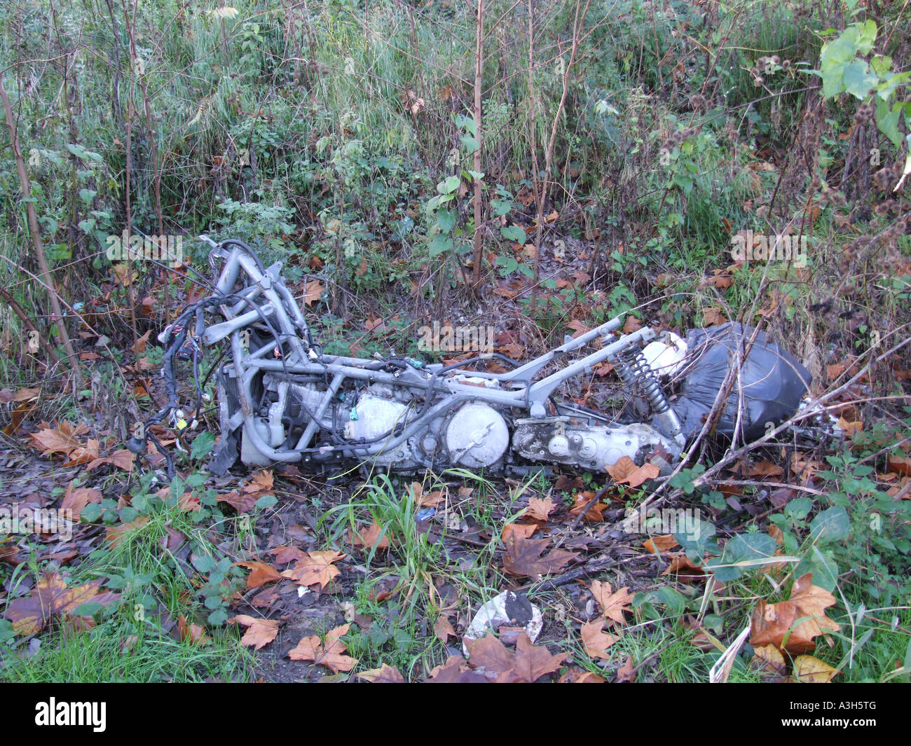 motorbike frame abandoned in countryside Stock Photo - Alamy