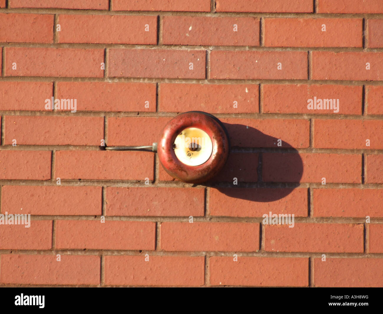 old alarm bell on outside property wall Stock Photo Alamy