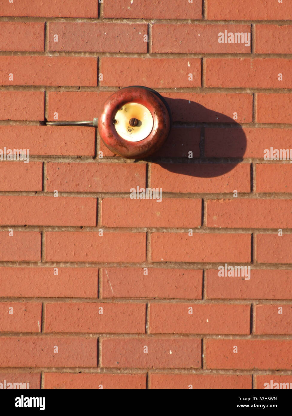 old alarm bell on outside property wall Stock Photo Alamy