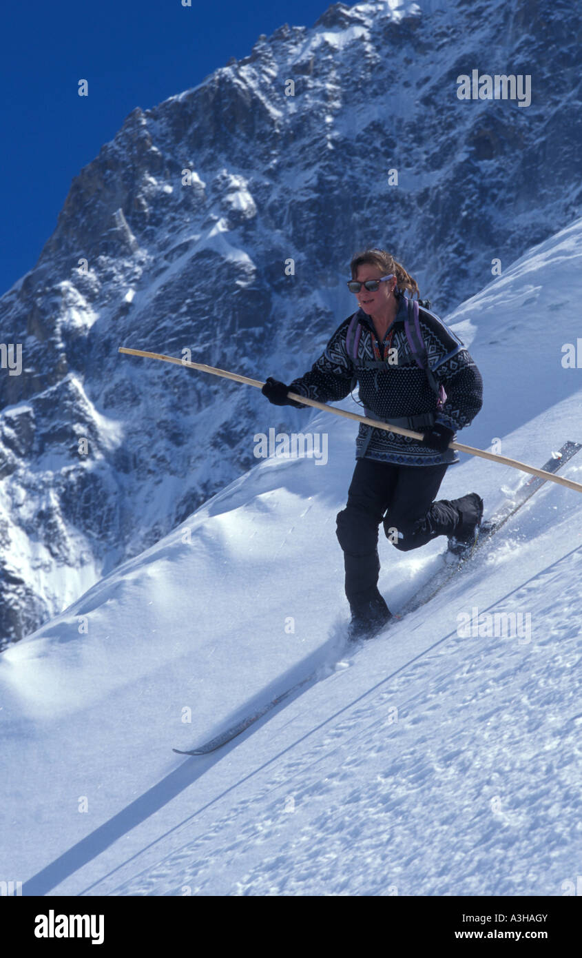 Telemark skier demonstrating long pole method of turning Stock Photo
