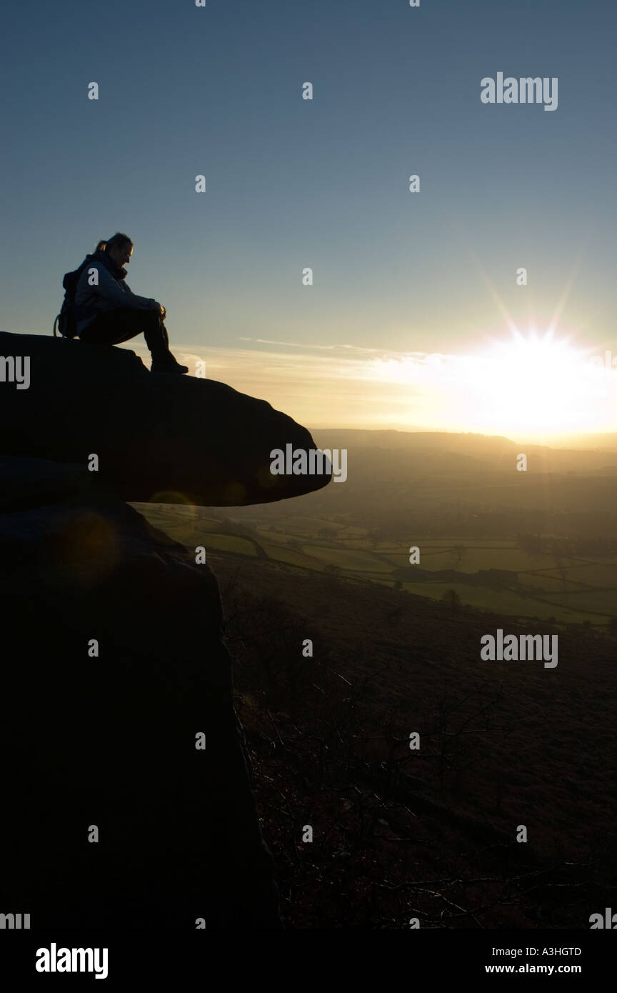 sunset on a grtistone edge in the Peak District National Park Derbyshire Stock Photo