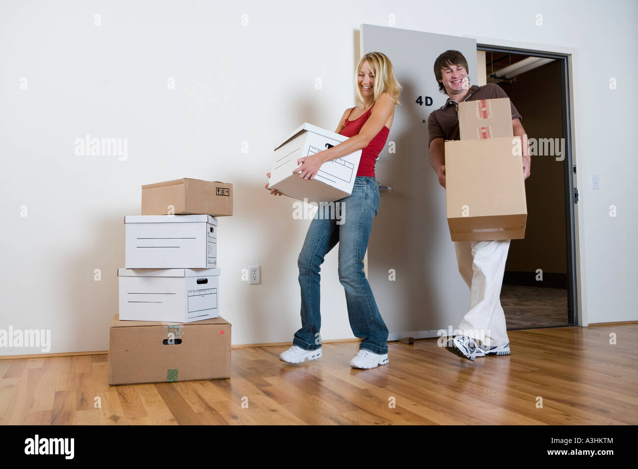 Couple Moving into New Home Stock Photo