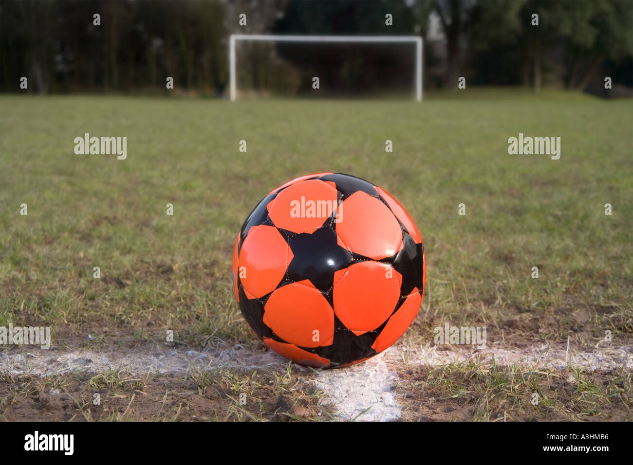 Soccer ball in field Stock Photo Alamy