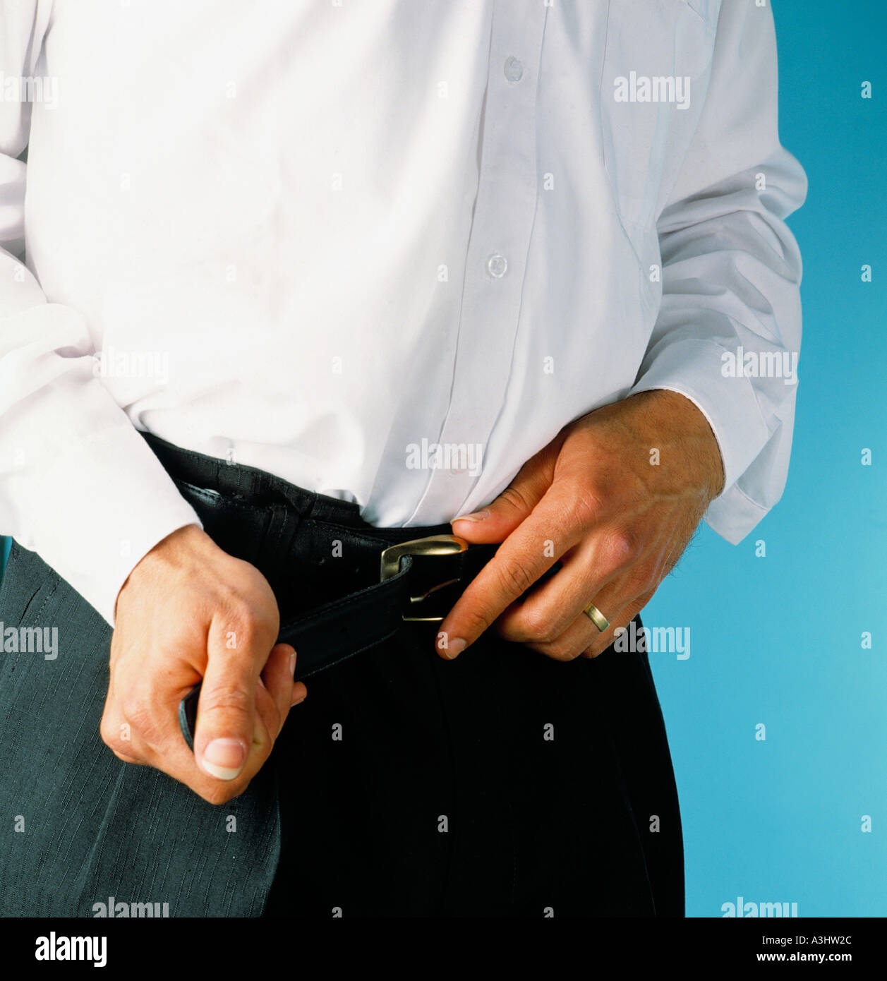 tightening the belt Stock Photo Alamy