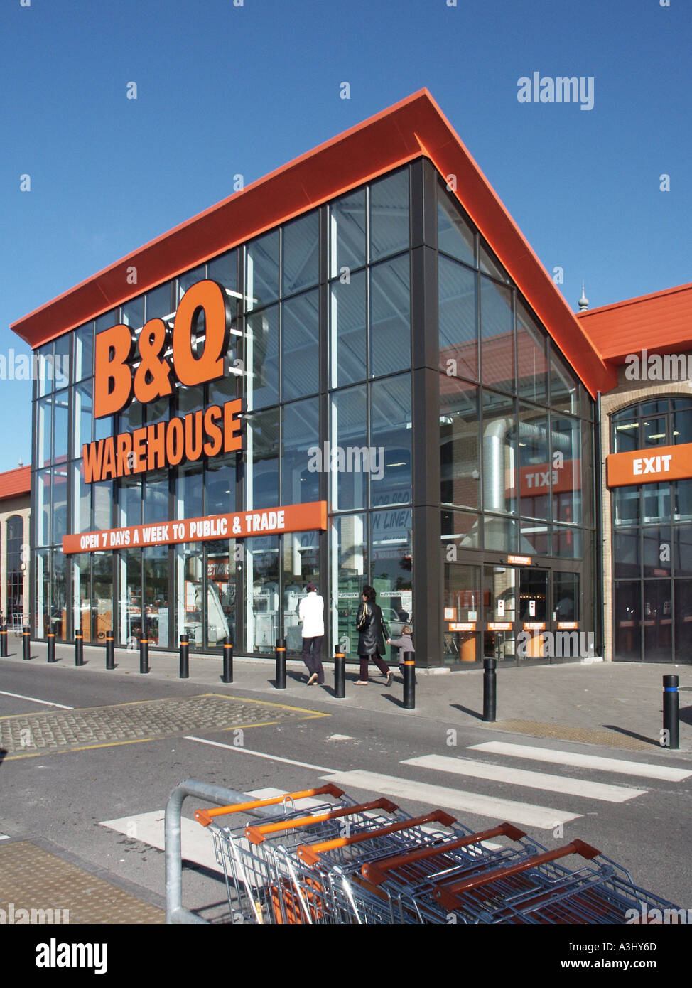 Chelmsford B&Q diy business retail store warehouse building with glass cladding to main entrance & exit area to car park Chelmsford Essex England UK Stock Photo