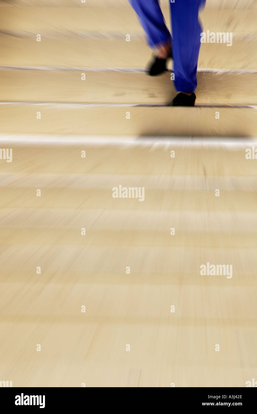 woman shopper walking down steps Stock Photo