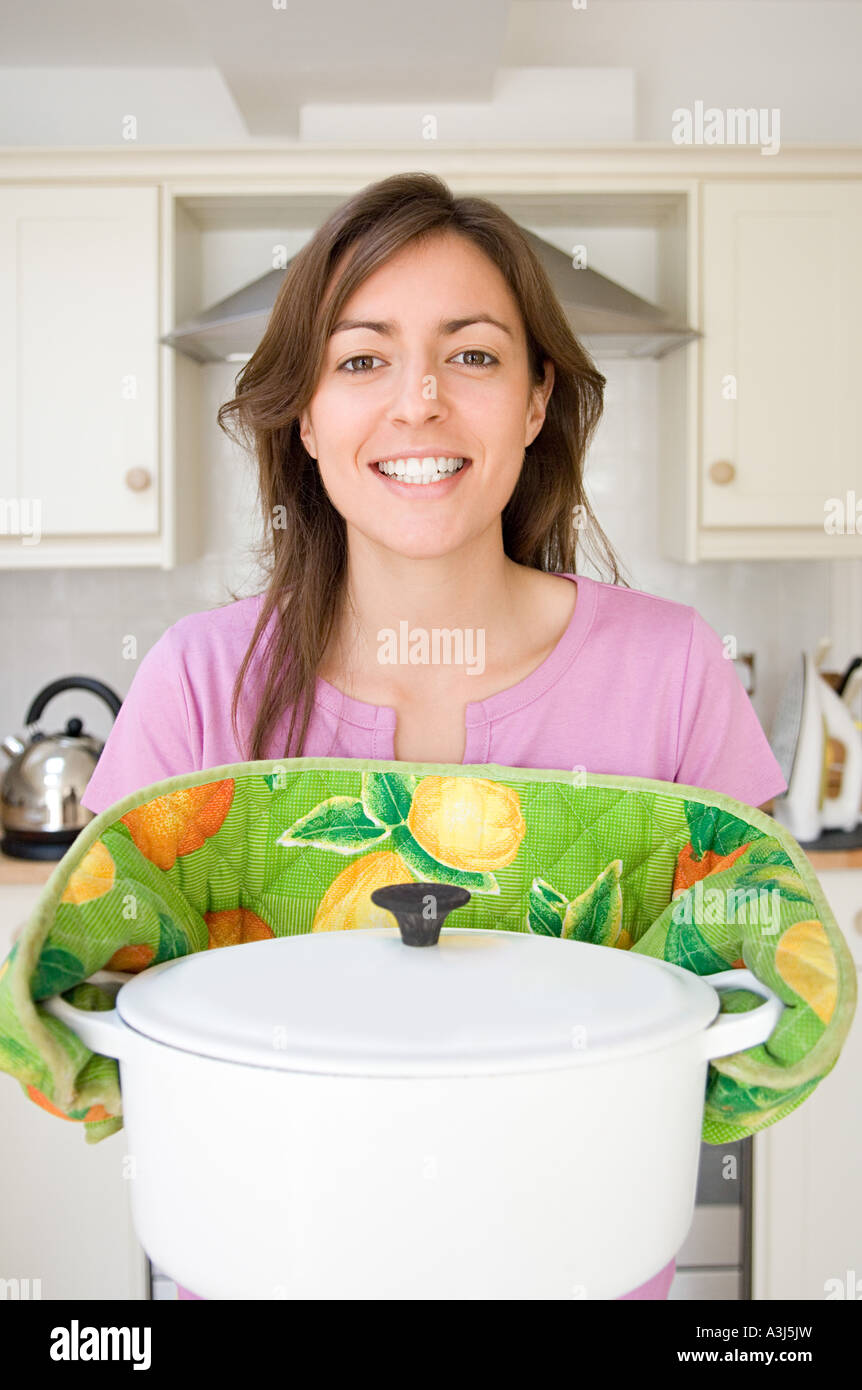 Woman holding casserole dish Stock Photo