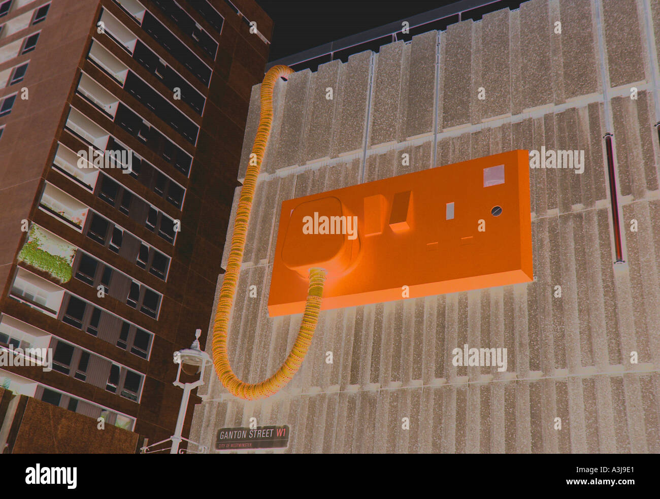 large plug on wall in london Stock Photo Alamy