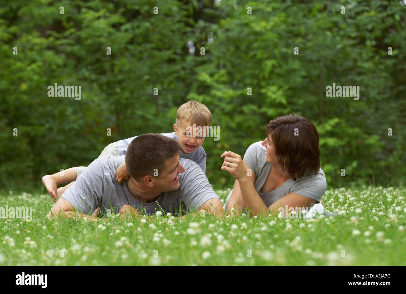 Family Playing Outdoors Stock Photo - Alamy