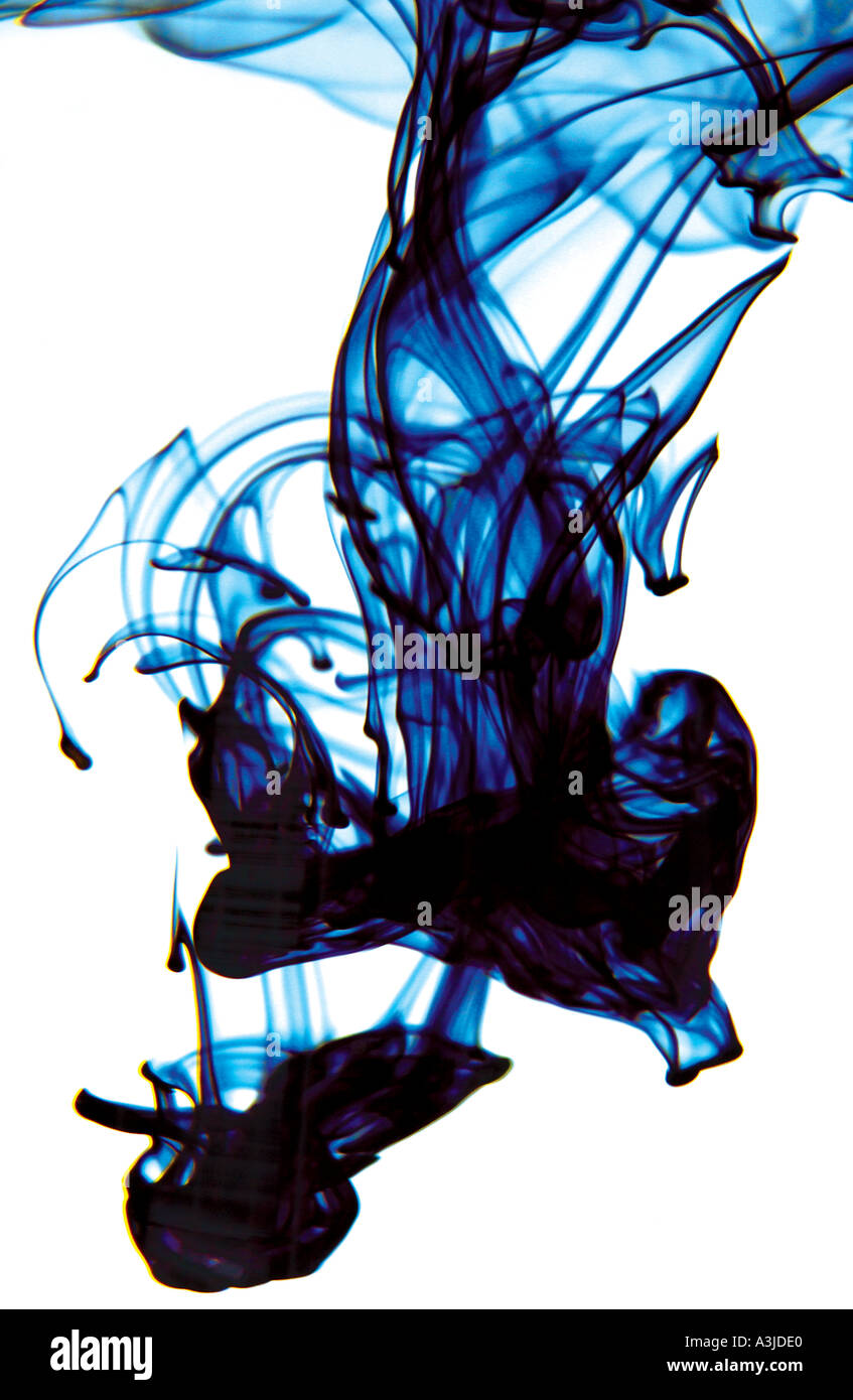 Close up of Liquid dye in water against white background Stock Photo