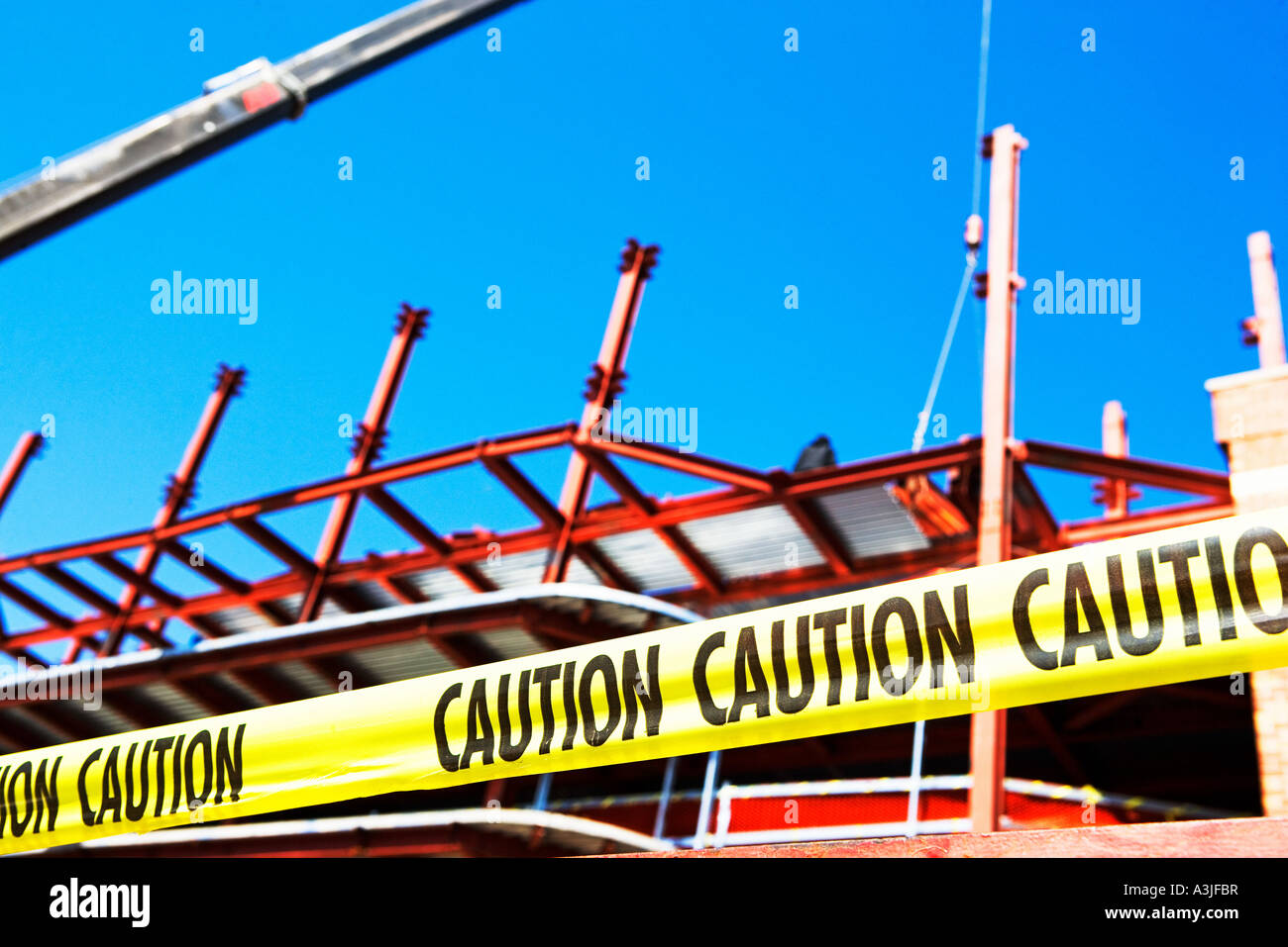 Caution tape at construction site Stock Photo Alamy