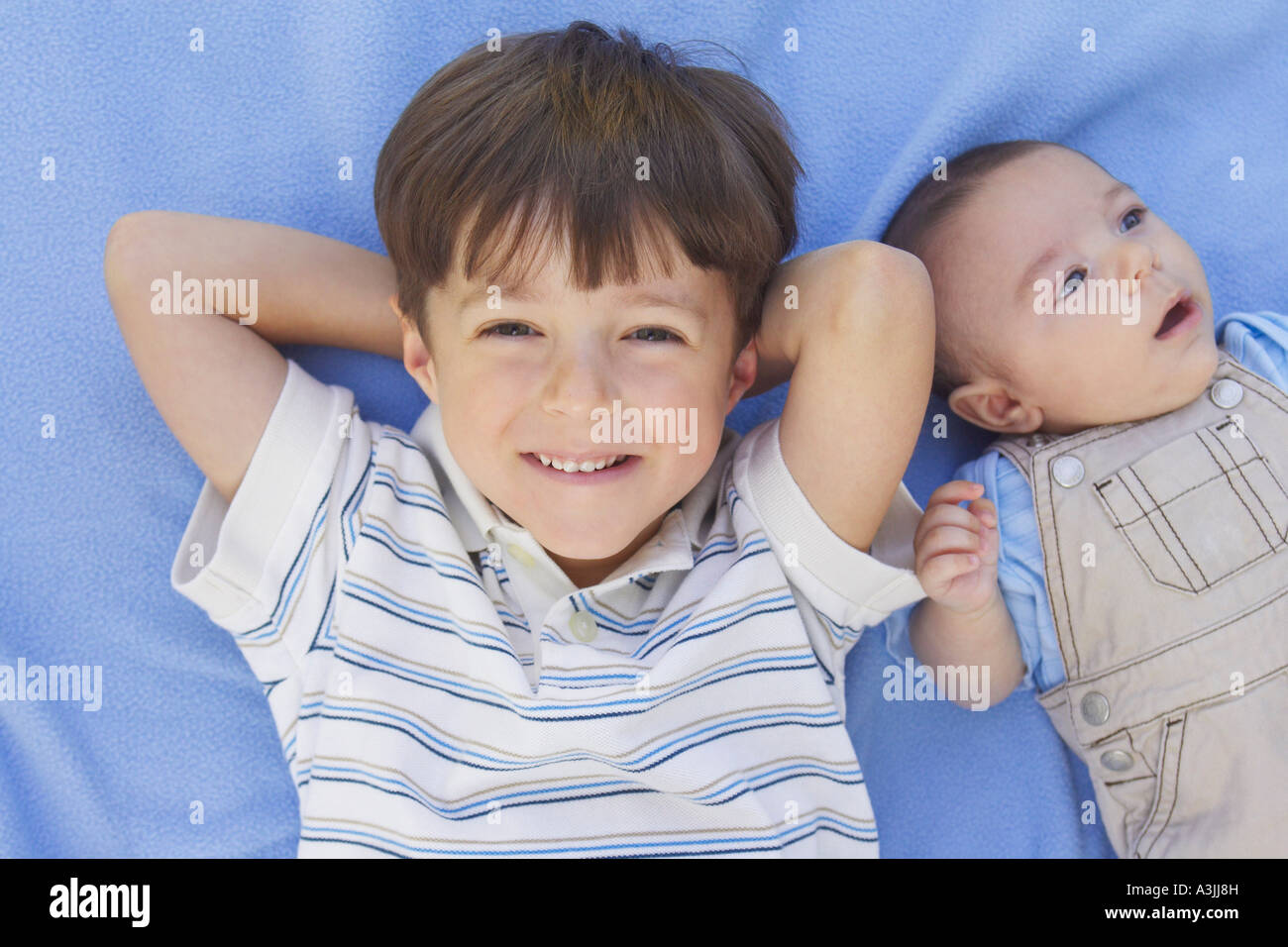 Portrait of Young Boy with Baby Brother Stock Photo