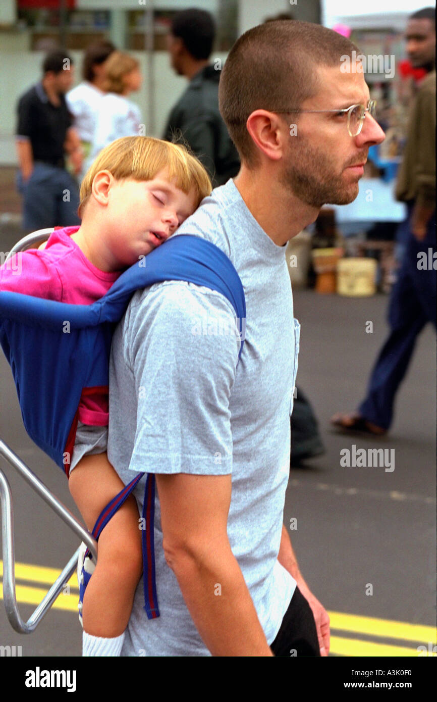 Dad carrying sleeping child in hires stock photography and images Alamy