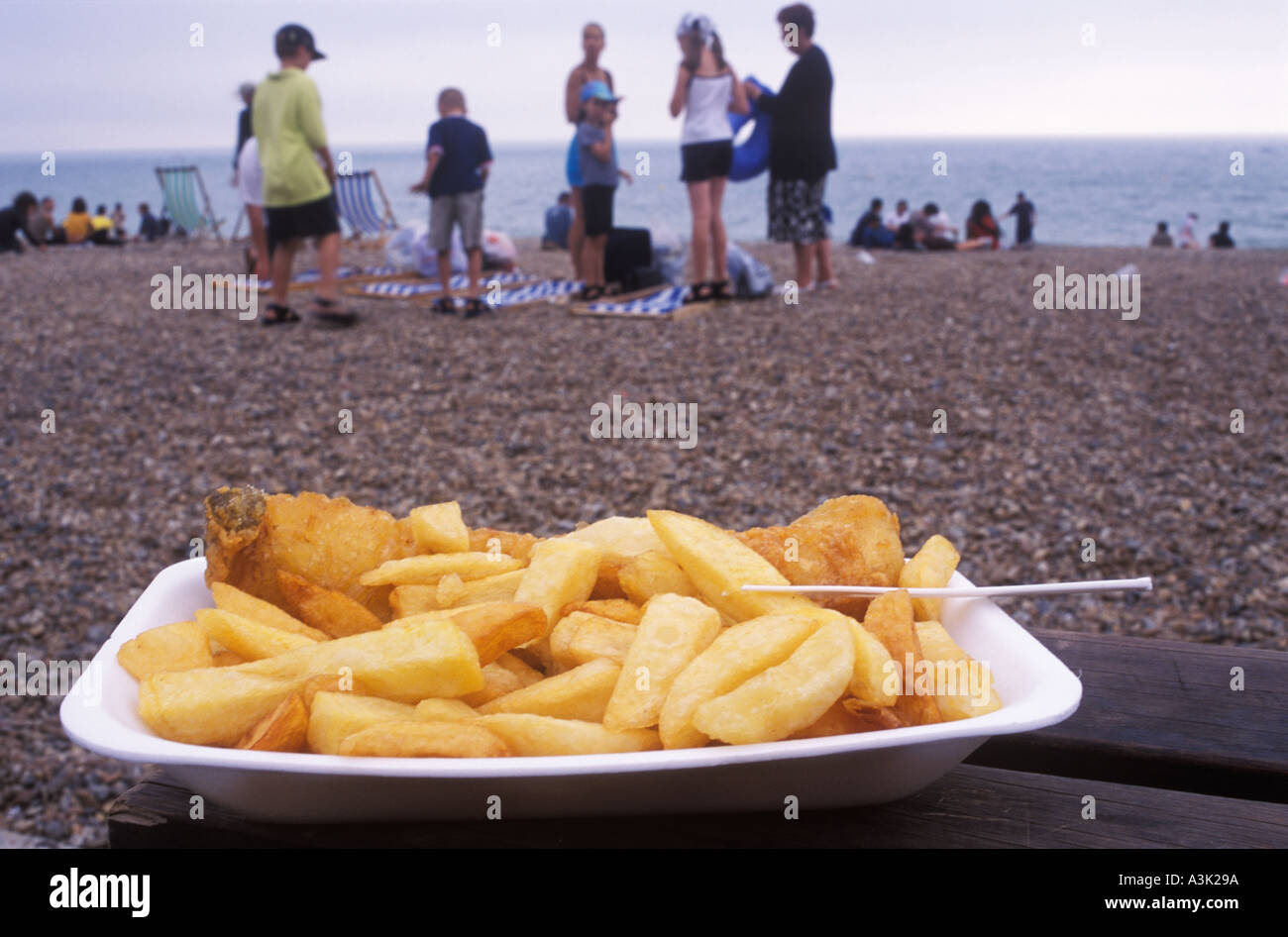 Fast food fish and chips polystyrene plastic plate beach holiday