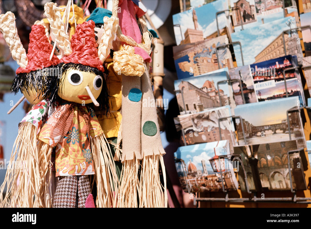 Stall With Dolls And Postcards In Florence In Italy Stock Photo