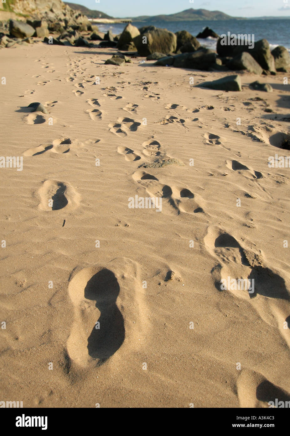 Footprints in sand Stock Photo