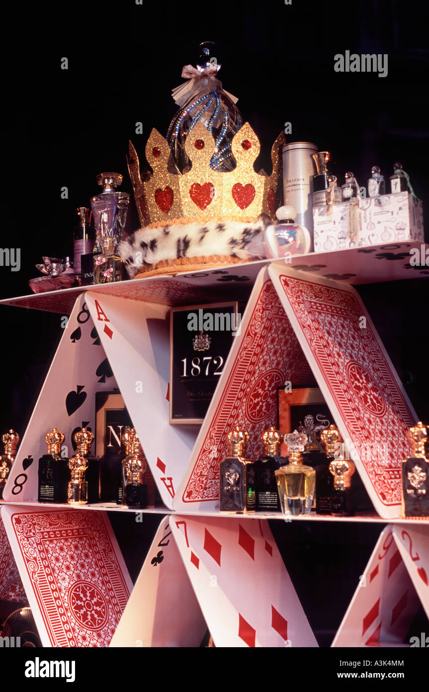 Pyramid of playing cards: Window display of perfumes at Fortnum and Mason at Christmas, Piccadilly, London Stock Photo