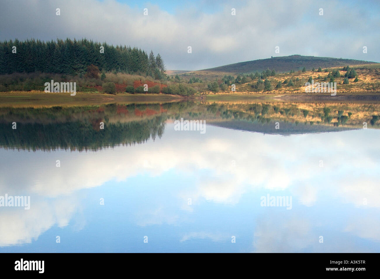 Autumnal reflections on Fernworthy Reservoir Stock Photo