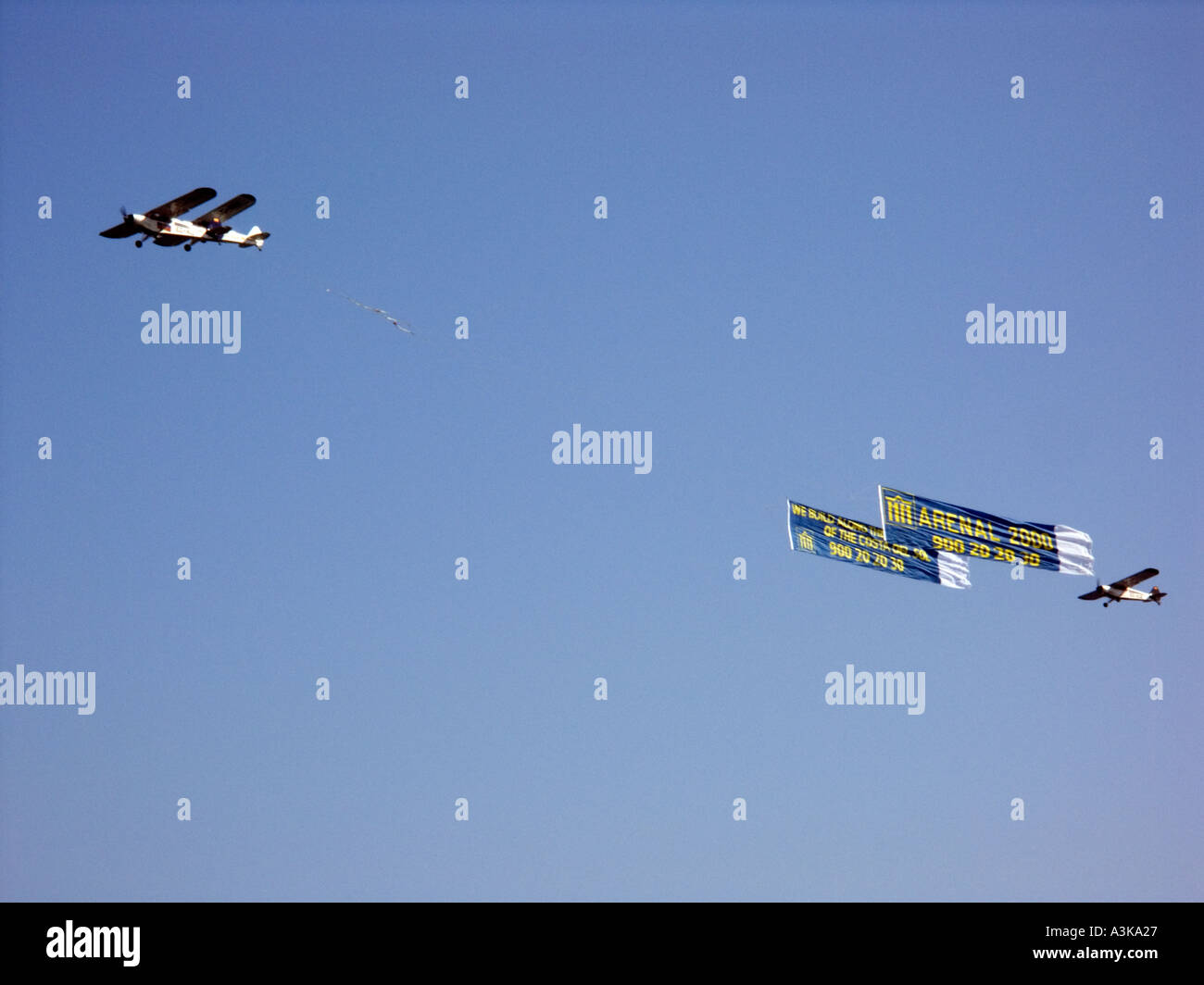 Three Aeroplanes towing Advertising Banners flying over La Cala de Mijas Beach, Mijas Costa, Malaga, Spain, Europe Stock Photo