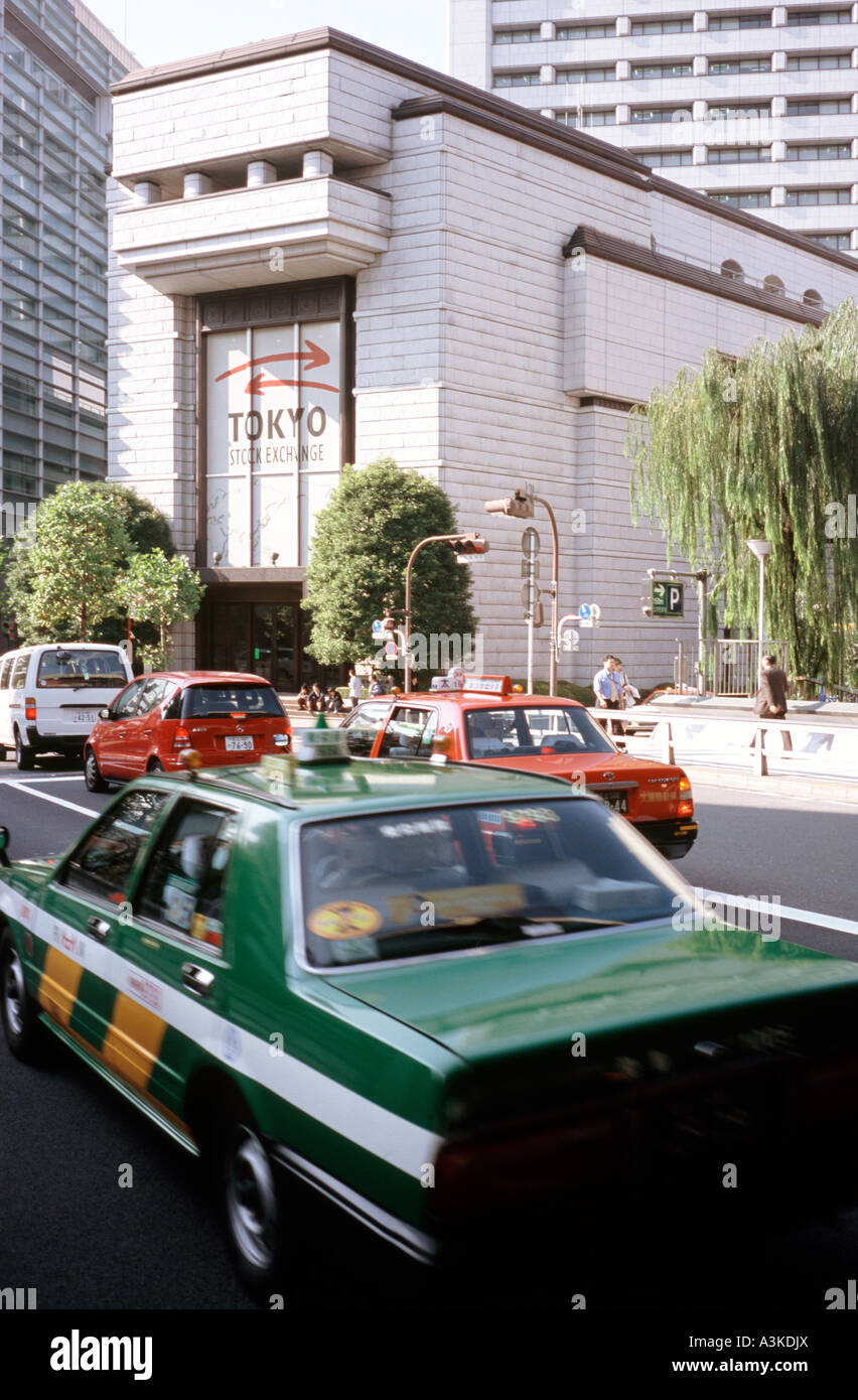 Nov 5, 2004 - Traffic passing the Tokyo Stock Exchange at Nihonbashi in Tokyo. Stock Photo
